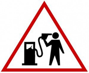 Warning sign gas pistol suicide. gas prices satire